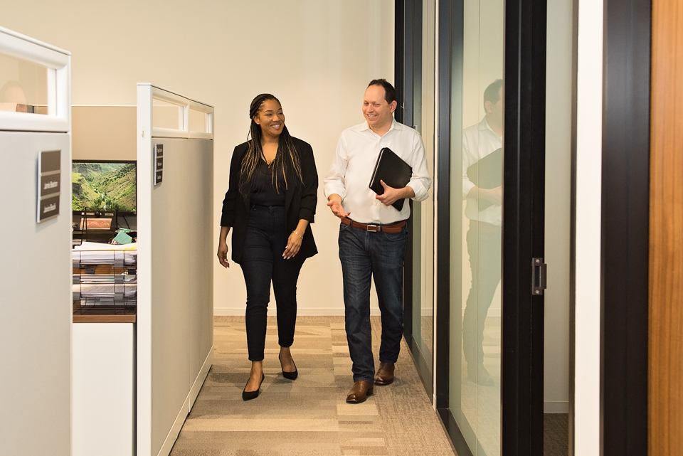 Questco employees walking and talking
